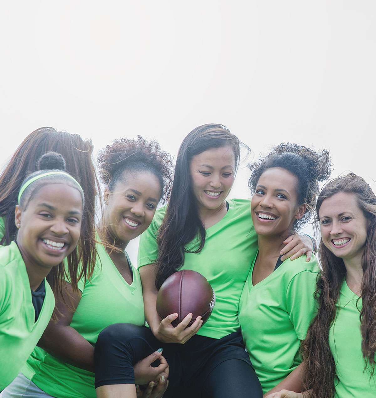 young women with football