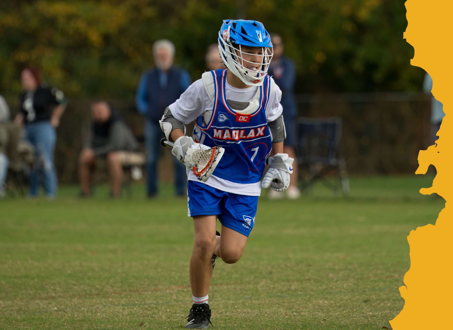 image of young man playing lacrosse